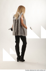 Woman Adult Average White Fighting with gun Standing poses Casual