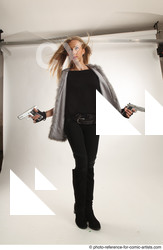 Woman Adult Average White Fighting with gun Standing poses Casual