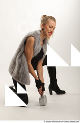 Woman Adult Average White Fighting with hammer Kneeling poses Coat