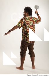 Man Adult Average Black Fighting with hammer Moving poses Coat