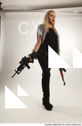 16 2018 01 NIKOL STANDING POSE WITH GUNS