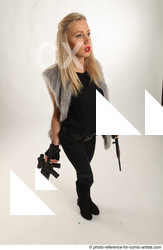 Woman Adult Average White Fighting with gun Standing poses Coat