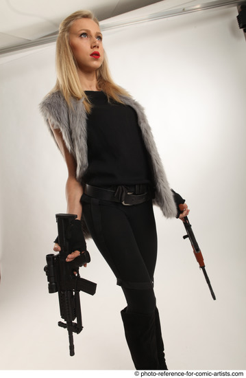 Woman Adult Average White Fighting with gun Standing poses Coat