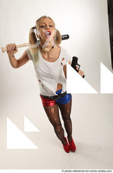 Woman Adult Average White Fighting with gun Standing poses Coat