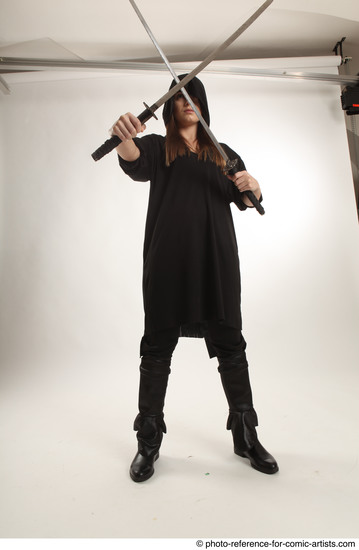 Woman Adult Average White Fighting with sword Standing poses Coat