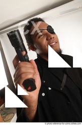 Man Adult Average Black Fighting with gun Standing poses Coat