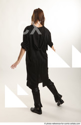 Woman Adult Average White Neutral Standing poses Coat