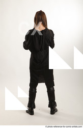 Woman Adult Average White Fighting with sword Standing poses Coat