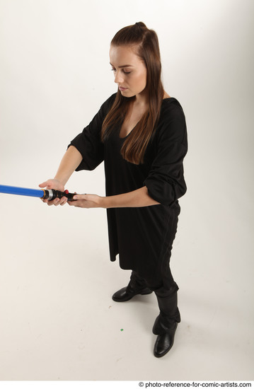 Woman Adult Average White Fighting with sword Standing poses Coat