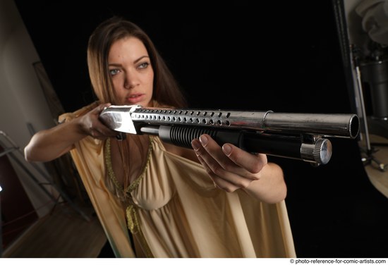 Woman Adult Average White Standing poses Casual Fighting with shotgun