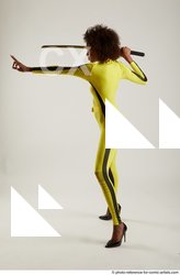 Woman Adult Average Black Fighting with sword Standing poses Casual