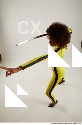 Woman Adult Average Black Fighting with sword Standing poses Casual