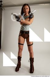 10 2018 01 SHRIMA STANDING POSE WITH TWO GUNS