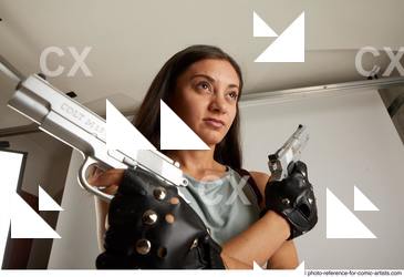 Woman Adult Average Fighting with gun Standing poses Casual Latino