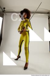 Woman Adult Average Black Fighting with sword Standing poses Casual