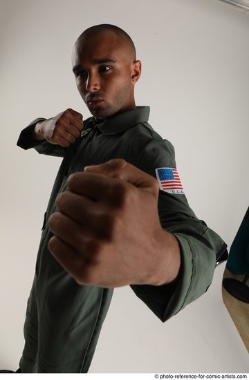 Man Adult Average Black Fighting without gun Standing poses Casual