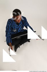 06 2018 01 GARSON SITTING POSE WITH GUNS