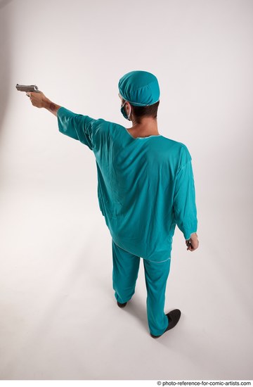 Man Adult Average White Fighting with gun Standing poses Casual