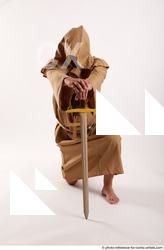 Man Adult Chubby White Neutral Kneeling poses Coat