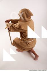 Man Adult Chubby White Neutral Kneeling poses Coat