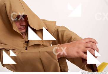 17 2018 01 JOEL ADAMSON MONK KNEELING POSE WITH SWORD