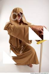 19 2018 01 JOEL ADAMSON MONK KNEELING POSE WITH SWORD