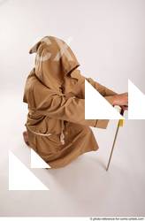 15 2018 01 JOEL ADAMSON MONK KNEELING POSE WITH SWORD