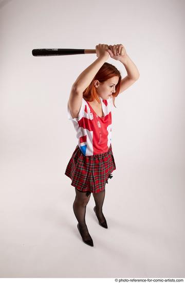Woman Adult Average White Standing poses Casual Fighting with bat