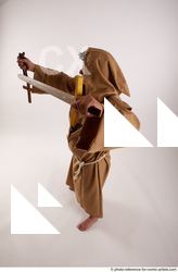 20 2018 01 JOEL ADAMSON MONK WITH CRUCIFIX AND SWORD