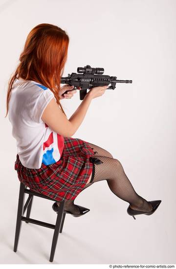 Woman Adult Average White Fighting with gun Sitting poses Casual