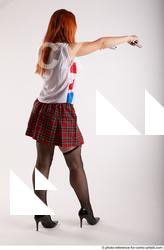 06 2018 01 TINA STANDING POSE WITH TWO GUNS