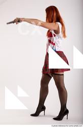Woman Adult Average White Fighting with gun Standing poses Casual