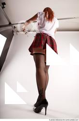 19 2018 01 TINA STANDING POSE WITH TWO GUNS