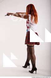 04 2018 01 TINA STANDING POSE WITH TWO GUNS