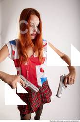 34 2018 01 TINA STANDING POSE WITH TWO GUNS