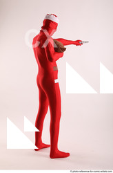 06 2018 01 JOEL ADAMSON CHRISTMAS HERO WITH GUN