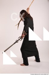 Man Adult Average White Fighting with sword Standing poses Coat