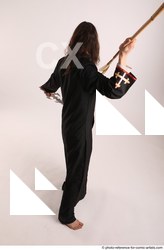 Man Adult Average White Fighting with sword Standing poses Coat