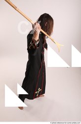 Man Adult Average White Fighting with sword Standing poses Coat