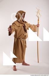 08 2019 01 JOEL ADAMSON MONK STANDING POSE WITH A…