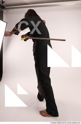 Man Adult Average White Fighting with sword Standing poses Coat