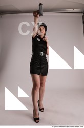 19 NIKITA POLICEWOMAN STANDING POSE WITH TWO GUNS