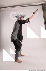 Man Adult Average White Fighting without gun Standing poses Coat