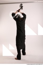 Man Adult Average White Fighting without gun Standing poses Coat