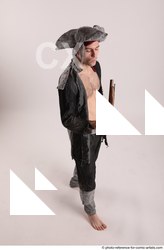 Man Adult Average White Fighting with gun Standing poses Coat