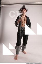 Man Adult Average White Fighting with gun Standing poses Coat