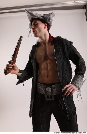 Man Adult Average White Fighting with gun Standing poses Coat