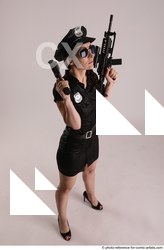 16 2019 01 NIKITA POLICEWOMAN WITH TWO GUNS