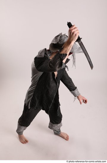 Man Adult Average White Fighting with knife Standing poses Casual