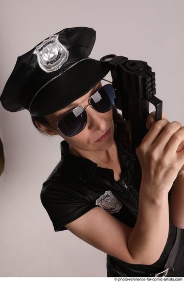 Woman Adult Average White Fighting with gun Standing poses Casual